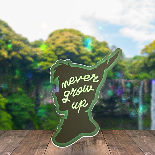 NEVER GROW UP Sticker